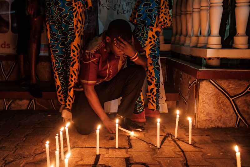 Members of the transgender and LGBTQ community light candles as they  pay tribute to victims of hate crimes in Uganda and all over the world, in Kampala, Uganda, on Nov. 23, 2019.