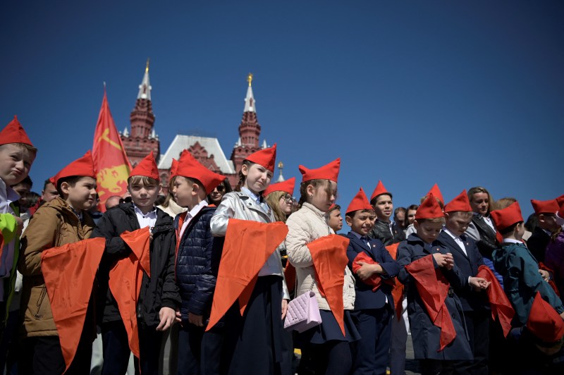Children attend an official initiation ceremony for the youth organization Young Pioneers in Moscow's Red Square.