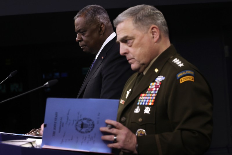U.S. Defense Secretary Lloyd Austin and Gen. Mark Milley, the chairman of the Joint Chiefs of Staff, participate in a news briefing at the Pentagon.