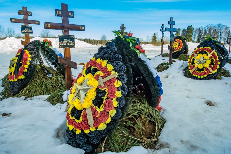 Graves of Wagner Group mercenaries killed in Russia's invasion of Ukraine dot the Mavrino village cemetery outside Moscow.