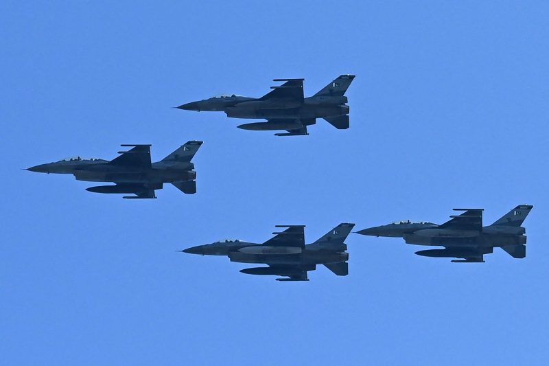 Pakistani Air Force F-16 fighter jets fly during a rehearsal ahead of the Pakistan Day parade in Islamabad, Pakistan, on March 15, 2022.