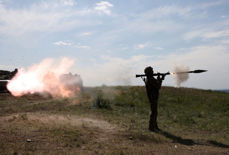 A Ukrainian soldier fires a rocket launcher during a military training exercise not far from the front line in the Donetsk region.