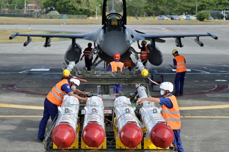 Members of the Taiwanese Air Force prepare to load U.S.-made Harpoon AGM-84 anti-ship missiles in front of an F-16 fighter jet during a drill at Chiashan Air Force Base, Hualien County, Taiwan, on Aug. 17, 2022.