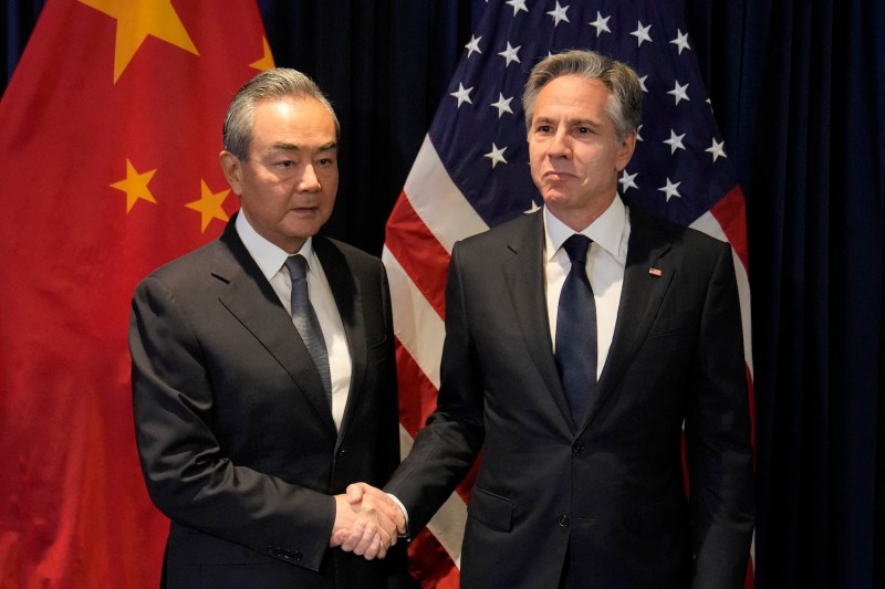 U.S. Secretary of State Antony Blinken (R) shakes hands with Chinese Director of the Office of the Central Foreign Affairs Commission Wang Yi in Jakarta, Indonesia.