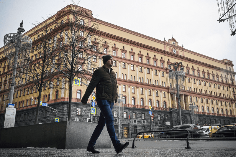 A man walks past the headquarters of the Federal Security Service, the successor agency to the KGB, in central Moscow.