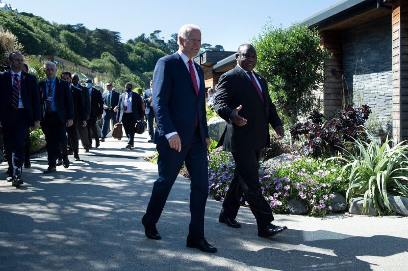 U.S. President Joe Biden and South African President Cyril Ramaphosa walk to a working session at the G-7 summit in Cornwall in the United Kingdom.