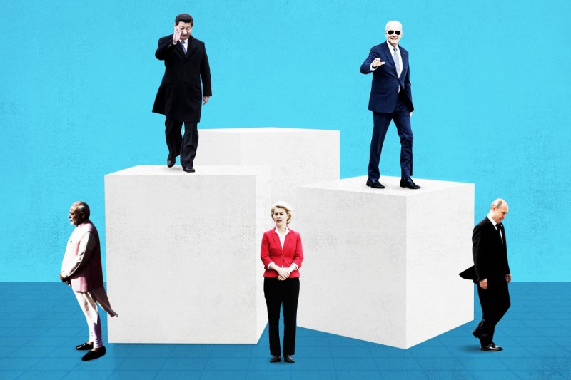 A photo illustration shows Chinese President Xi Jinping and U.S. President Joe Biden posing on pedestals atop the bipolar world order, with Indian Prime Minister Narendra Modi, European Commission President Ursula von der Leyen, and Russian President Vladamir Putin standing below on a gridded floor.