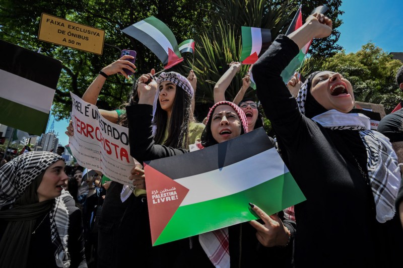 People take part in a demonstration against Israel's military offensive in the Gaza Strip in São Paulo on Oct. 22.