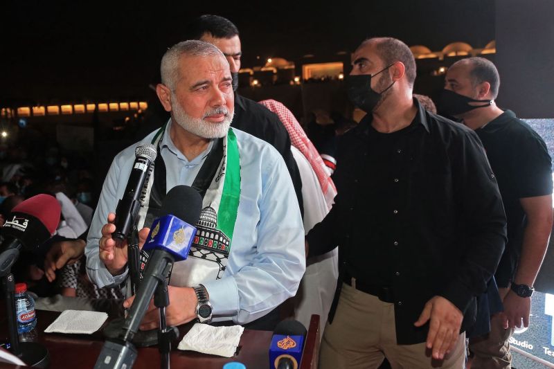 Hamas' political bureau chief Ismail Haniyeh addresses supporters during a rally in solidarity with the Palestinians outside Qatar's Imam Muhammad Abdel-Wahhab Mosque in the capital Doha on May 15, 2021.