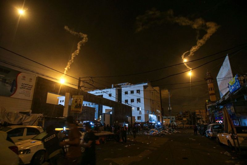 Israeli flares light up over Gaza City.