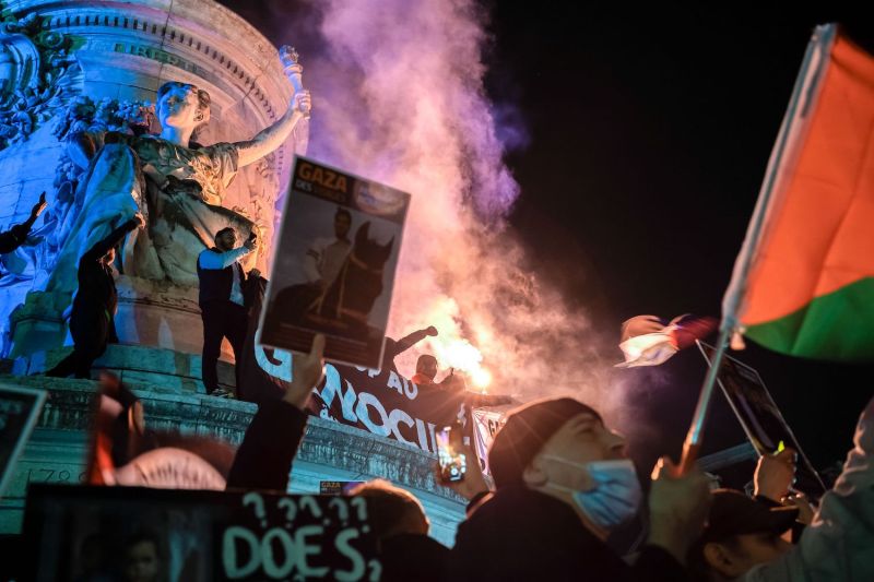 Individuals gather in Paris for a demonstration in support of the Palestinian people.