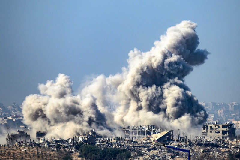Smoke rises from buildings hit by Israeli strikes in Gaza.