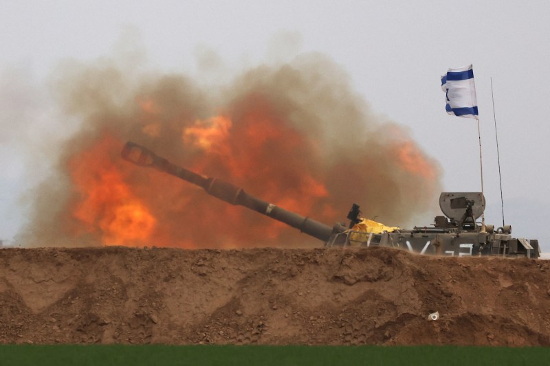 Israeli artillery fires toward Gaza.