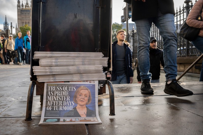 The cover of the newspaper, the Evening Standard, is seen on a busy street in London.