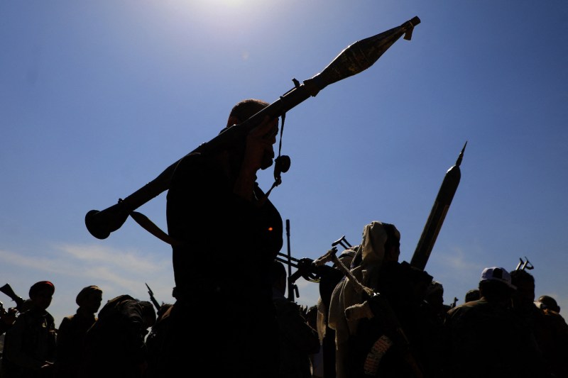 Armed supporters of Yemen's Houthi rebels attend a rally in solidarity with Hamas in the Yemeni capital of Sanaa.
