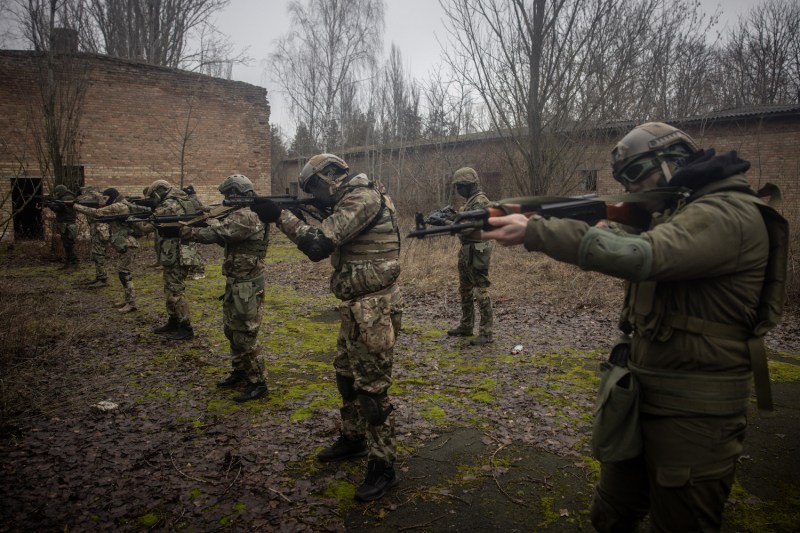 Civilians take part in a military training activity day conducted by the Ukrainian Volunteer Army in Kyiv on Feb. 17.
