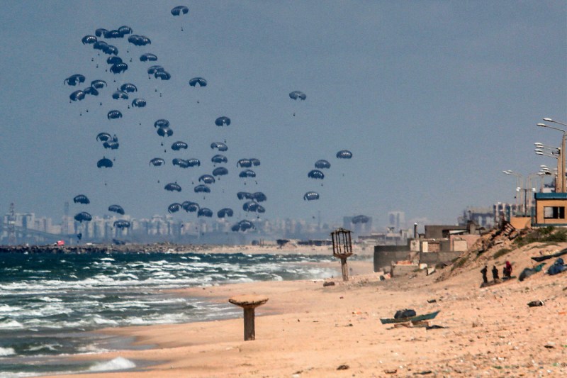 Humanitarian aid is airdropped over the Gaza Strip.