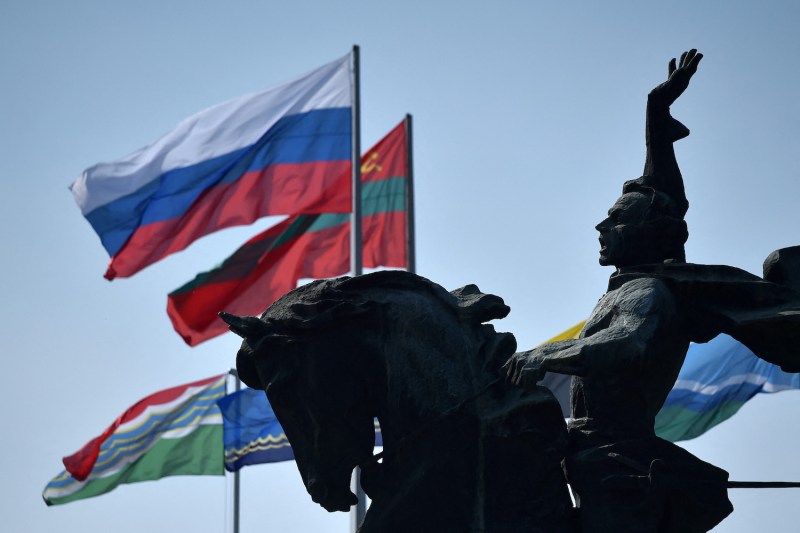 State flags of Russia and Transnistria fly close to the monument of the 18th-century Russian military commander Alexander Suvorov in Transnistria.