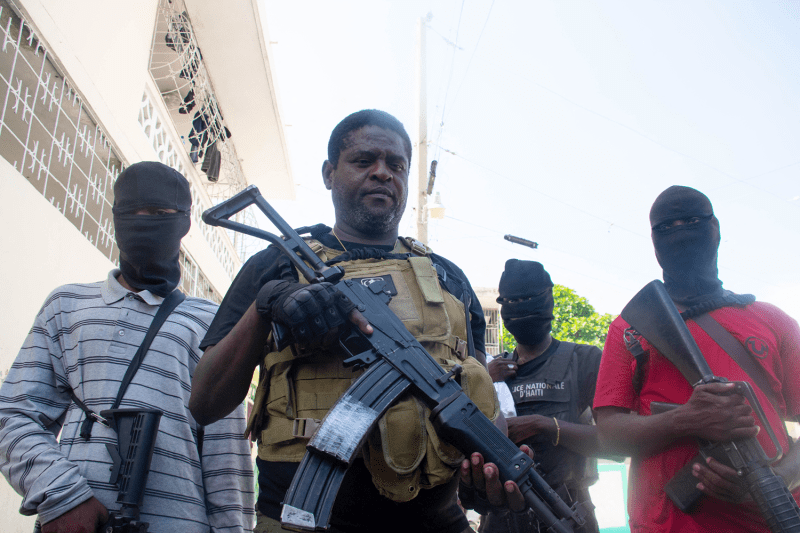 Armed gang leader Jimmy "Barbecue" Chérizier and his men are seen in Port-au-Prince, Haiti.