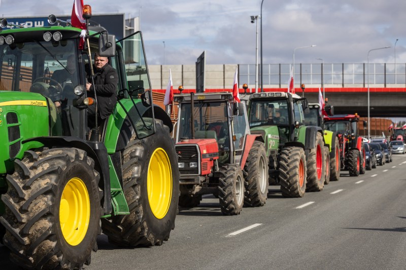 Polish farmers on their tractors take part in a blockade in Zakret, a suburb of Warsaw, Poland.