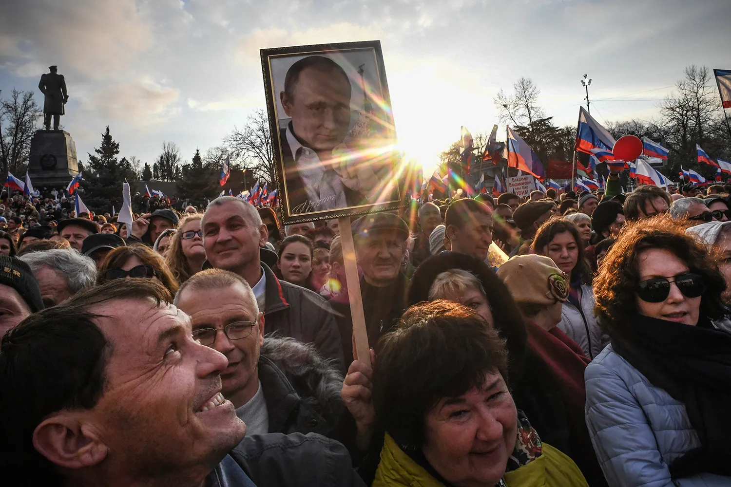 Supporters of Russian President Vladimir Putin gather for a rally to celebrate the fourth anniversary of Russia’s annexation of Crimea at Sevastopol’s Nakhimov Square.