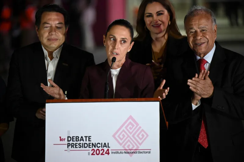 Mexican presidential candidate Claudia Sheinbaum speaks at a press conference at the headquarters of the National Electoral Institute in Mexico City after a debate on April 7.