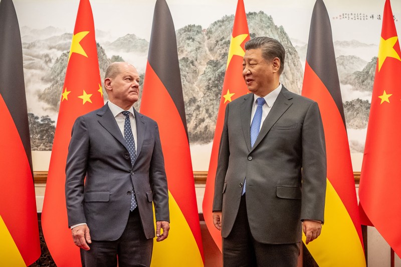 German Chancellor Olaf Scholz appears with Chinese President Xi Jinping at the State Guest House in Beijing on April 16.
