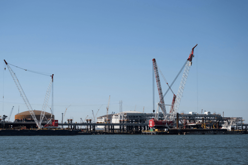 Construction cranes are seen near the construction site of the Venture Global LNG plant in Plaquemines Parish south of New Orleans, Louisiana.