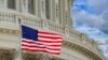 U.S. -- Washington DC Capitol dome detail with waving americanstar and stripes flag, undated