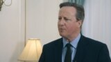 Kyrgyzstan - British Foreign Secretary David Cameron speaks with RFE/RL's Kyrgyz Service on April 22 - screen grab