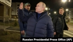 Владимир Путин в оккупированном Мариуполе, март 2023 года