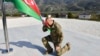 Президент Азербайджана Ильхам Алиев поднимает Государственный флаг Азербайджана в бывшем нагорно-карабахском городе Ходжалы и селе Аскеран, Азербайджан, 15 октября 2023 года