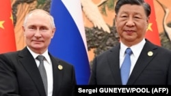 Президент России Владимир Путин и глава Китая Си Цзиньпин во время встречи в Пекине. 18 октября 2023 года