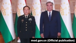 The proposal to transfer ownership of the base to China was presented by Tajik President Emomali Rahmon (right) to Chinese Defense Minister Wei Fenghe during his trip to Tajikistan earlier this year. 