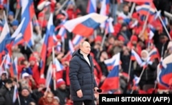 Владимир Путин на праздновании годовщины аннексии Крыма на стадионе в Лужниках 18 марта 2022 года