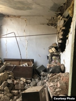 Спальня в квартире Павла Глущенко после попадания снаряда