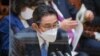 Japan's Prime Minister Fumio Kishida answers questions about the crisis between Russia and Ukraine, during an upper house budget committee session at parliament in Tokyo on February 28, 2022.