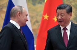 Си Цзиньпин на встрече в Пекине с президентом России Владимиром Путиным, накануне открытия зимних Олимпийских игр. 4 февраля 2022 года