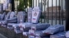 Картонные гробы у посольства России во время акции против российской агрессии в Донбассе. Киев, июнь 2018 года