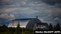 Новое укрытие, построенное поверх бетонного саркофага над четвертым аварийным энергоблоком Чернобыльской АЭС