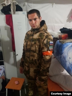 Егор Папуков в военной форме