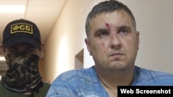 Евгений Панов после задержания, архивное фото 