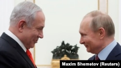 Russian President Vladimir Putin (right) meets with Israeli Prime Minister Benjamin Netanyahu in Moscow in January 2020. 