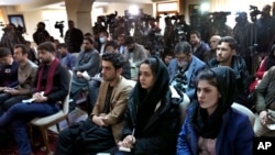 Afghan journalists attend a press conference by former Afghan President Hamid Karzai in Kabul in February 2022.