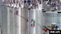 Various centrifuge machines line a hallway at Iran's Natanz uranium enrichment facility.