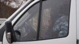 Российский силовик за рулем микроавтобуса в Крыму. Иллюстративное фото