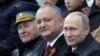 Путин и президент Молдовы Додон, который всецело устраивал Москву. 2017