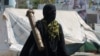 Женщина-боец одного из племенных боевых отрядов "южных" йеменских сепаратистов, противостоящих хуситам, с ПЗРК в руках. 26 марта