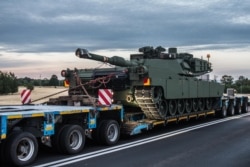 Американские танки М1 "Абрамс" по прибытии в Польшу для передачи польским ВС. Июнь 2022 года