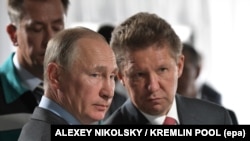 Владимир Путин и глава "Газпрома" Алексей Миллер